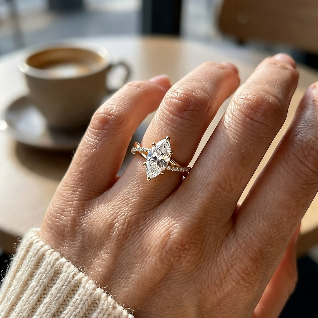 1.5 carat marquise lab grown diamond engagement ring worn on a hand at AJ's Jewelry in Ridgewood, Queens NY