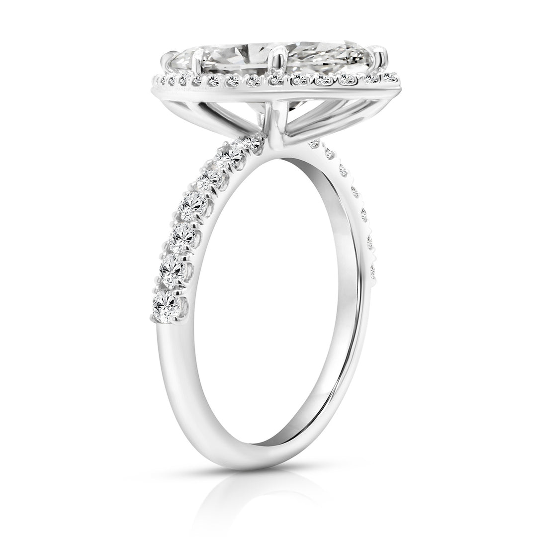 14 karat white gold 3ct marquise lab-grown diamond halo engagement ring, side profile view showing the diamond halo and pave band