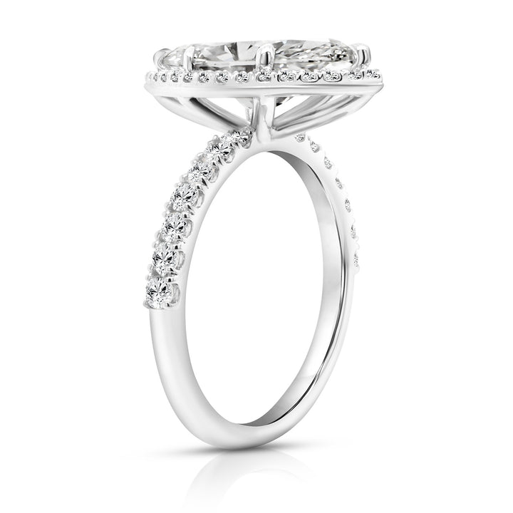 14 karat white gold 3ct marquise lab-grown diamond halo engagement ring, side profile view showing the diamond halo and pave band