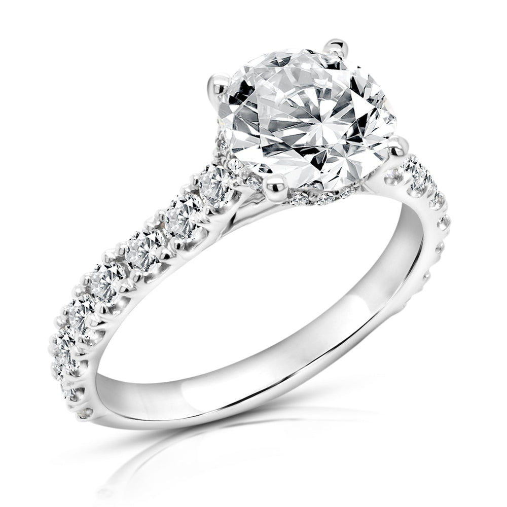 14 karat white gold 3ct round lab grown diamond hidden halo engagement ring with diamond accent band, angled three-quarter view