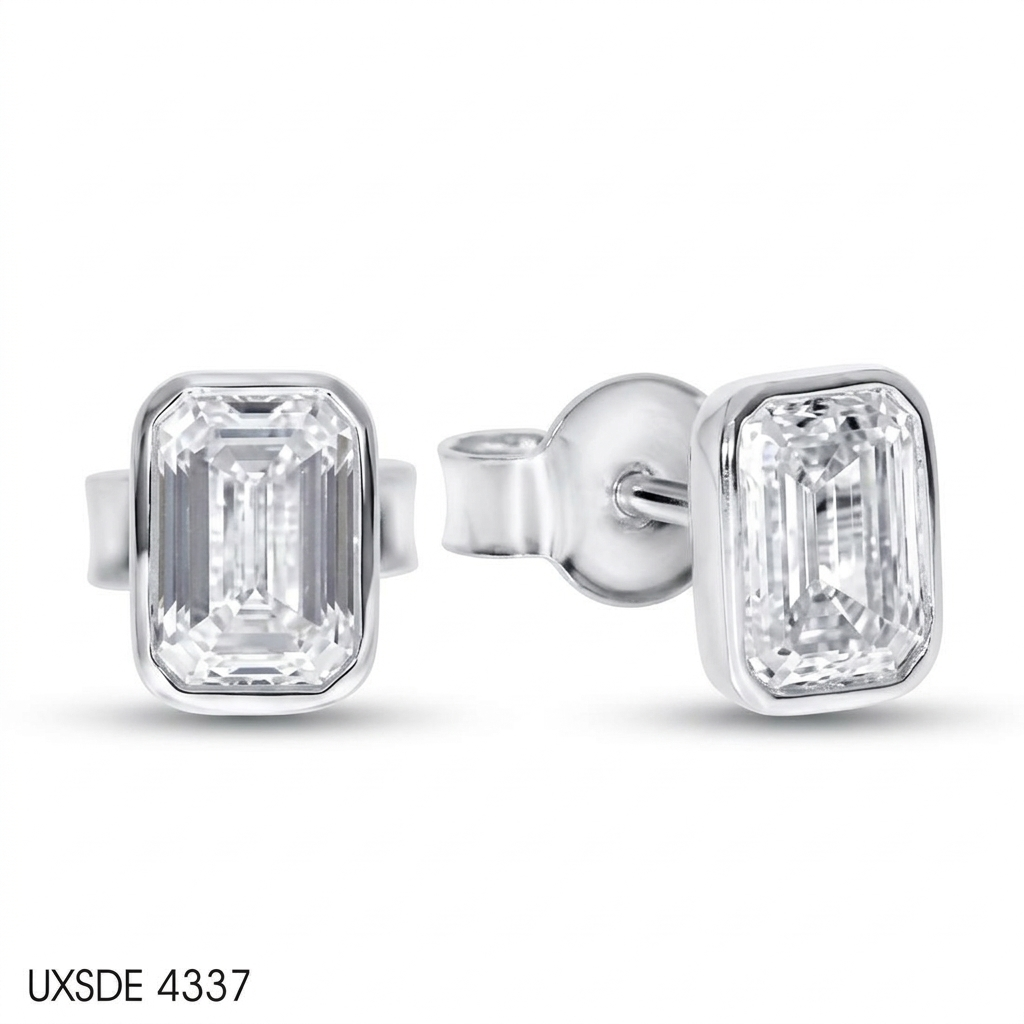 14K white gold bezel-set emerald-cut lab-grown diamond engagement ring