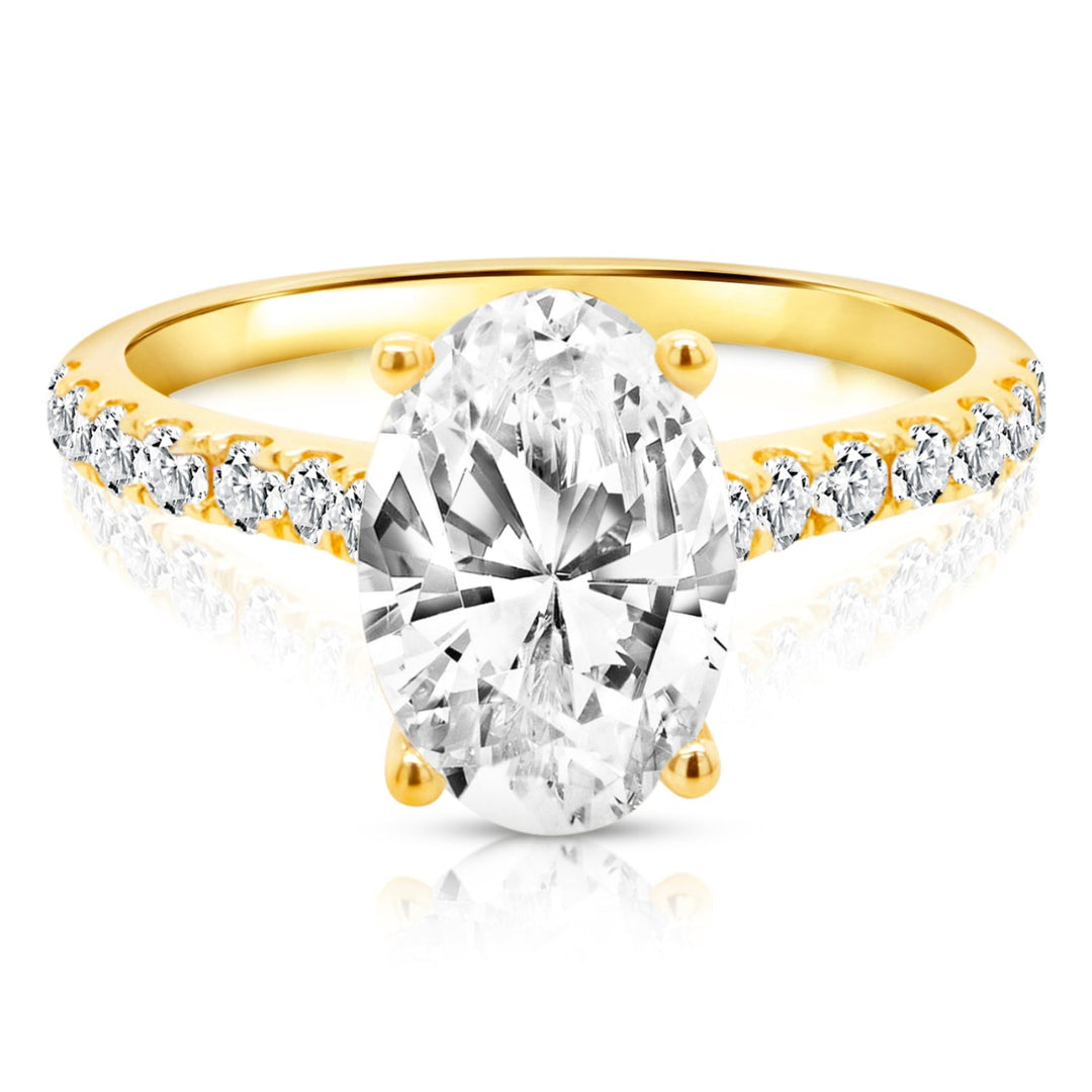 14 karat yellow gold 2ct oval lab grown diamond cathedral engagement ring with diamond accent band, front view