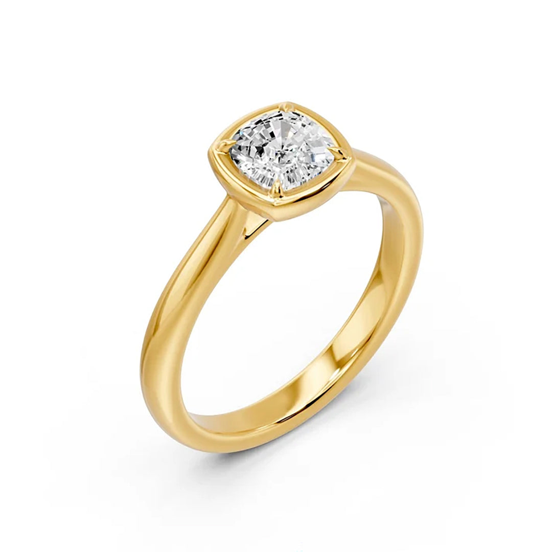 14K yellow gold bezel solitaire ring with a cushion-cut lab grown diamond