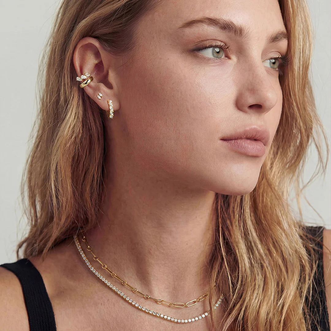 Lifestyle photo of the 14K yellow gold double marquise lab grown diamond stud earrings on a model | AJ's Jewelry