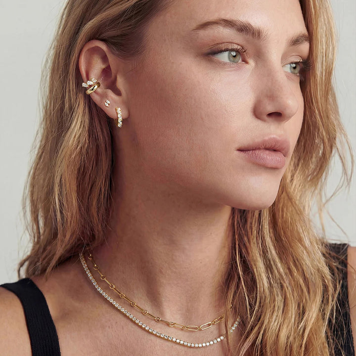 Lifestyle photo of the 14K yellow gold double marquise lab grown diamond stud earrings on a model | AJ's Jewelry