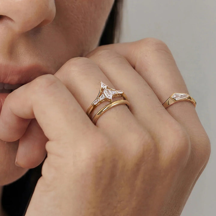 The 14K yellow gold fancy-cut lab grown diamond geometric solitaire ring shown on a model's hand | AJ's Jewelry