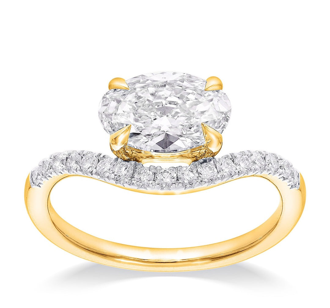 14K yellow gold oval lab-grown diamond engagement ring with curved pave band