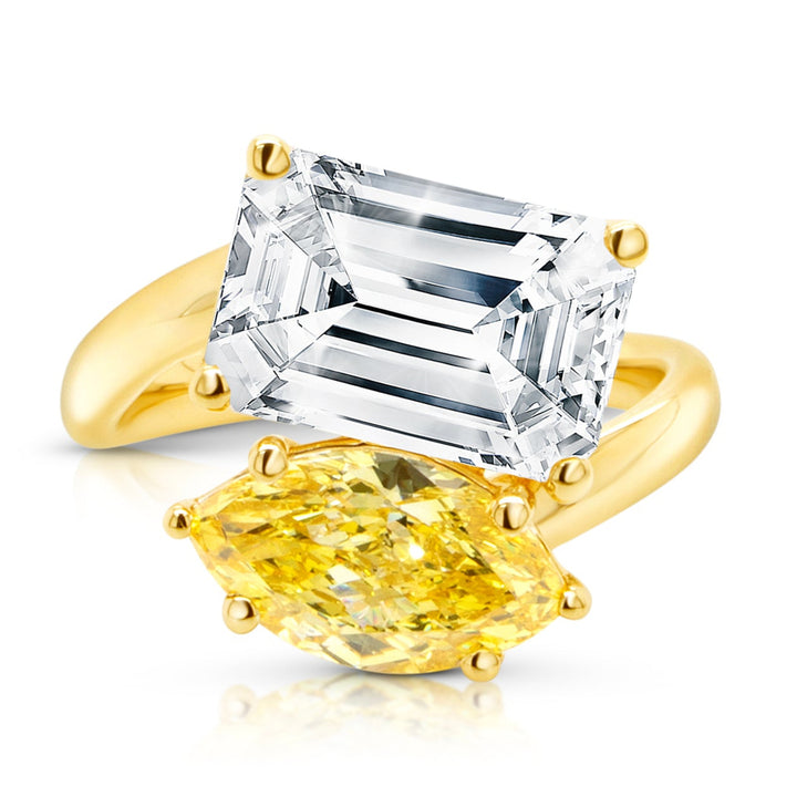 14 karat yellow gold toi et moi engagement ring with a 3ct emerald shape lab grown diamond and a fancy vivid yellow marquise lab grown diamond, front view