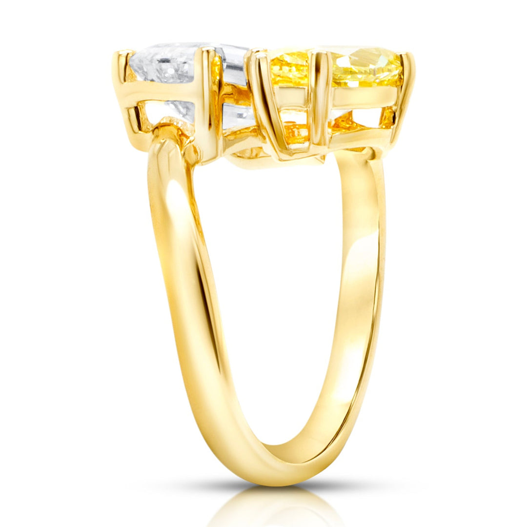 14 karat yellow gold toi et moi engagement ring with a 3ct emerald shape lab grown diamond and a fancy vivid yellow marquise lab grown diamond, side profile view