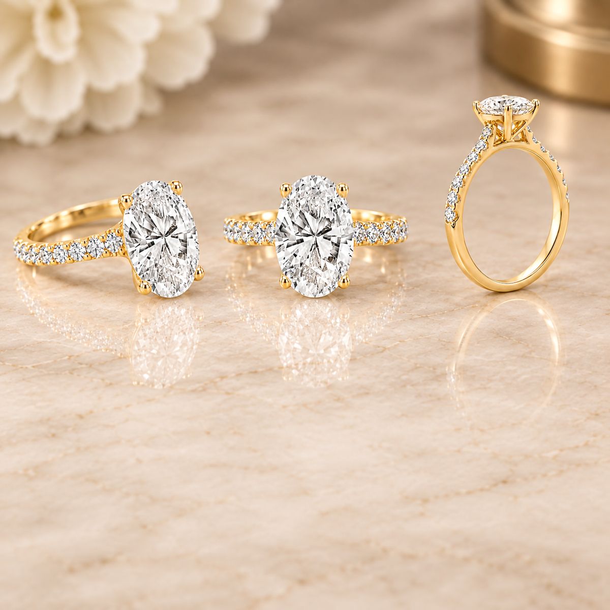 14 karat yellow gold 2ct oval lab grown diamond engagement ring with a diamond band, custom made at AJ's Jewelry in Ridgewood Queens
