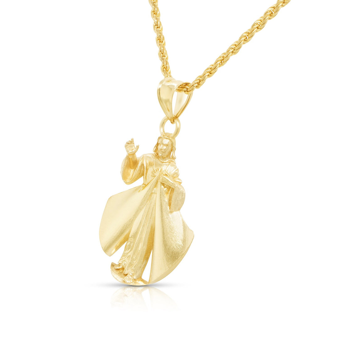 Angle view of the finished 14 karat yellow gold Divine Mercy pendant showing three-dimensional relief — AJ's Jewelry Ridgewood Queens NY