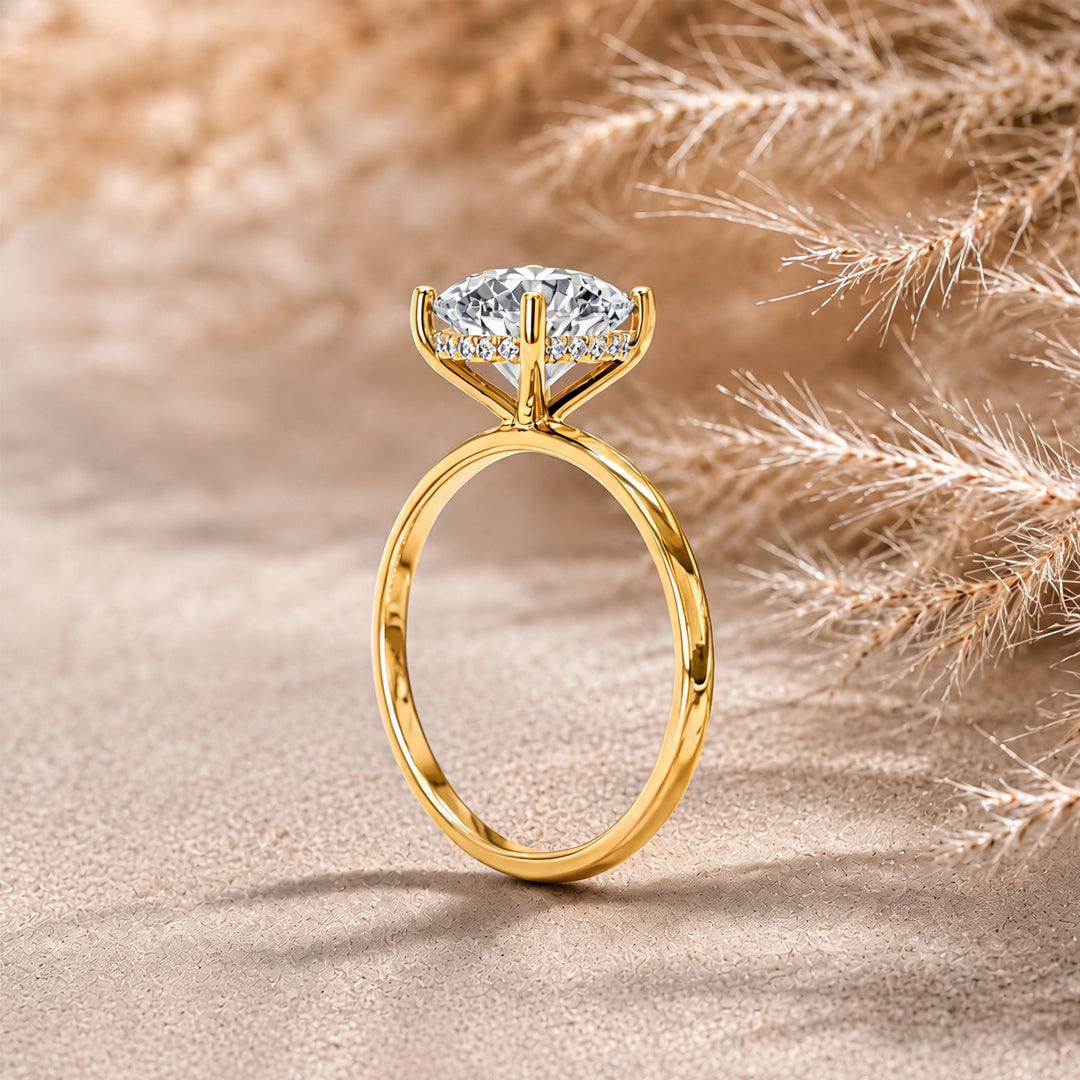 Side profile of a 2ct round lab grown diamond engagement ring revealing the hidden halo beneath the crown in 14k yellow gold, AJ's Jewelry Queens NY