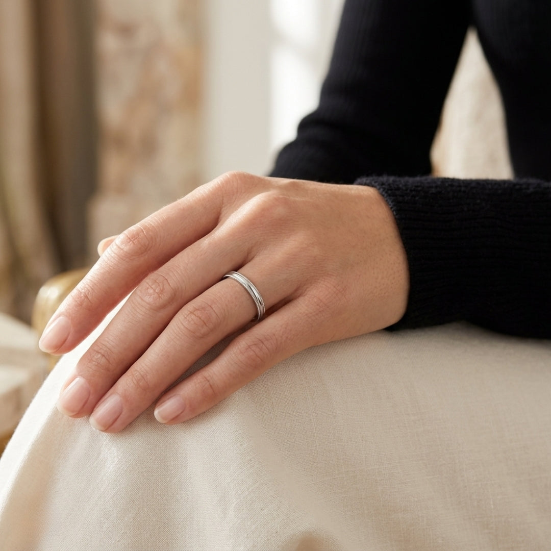 A model wearing the 3mm White Gold Comfort Fit Milgrain Wedding Band