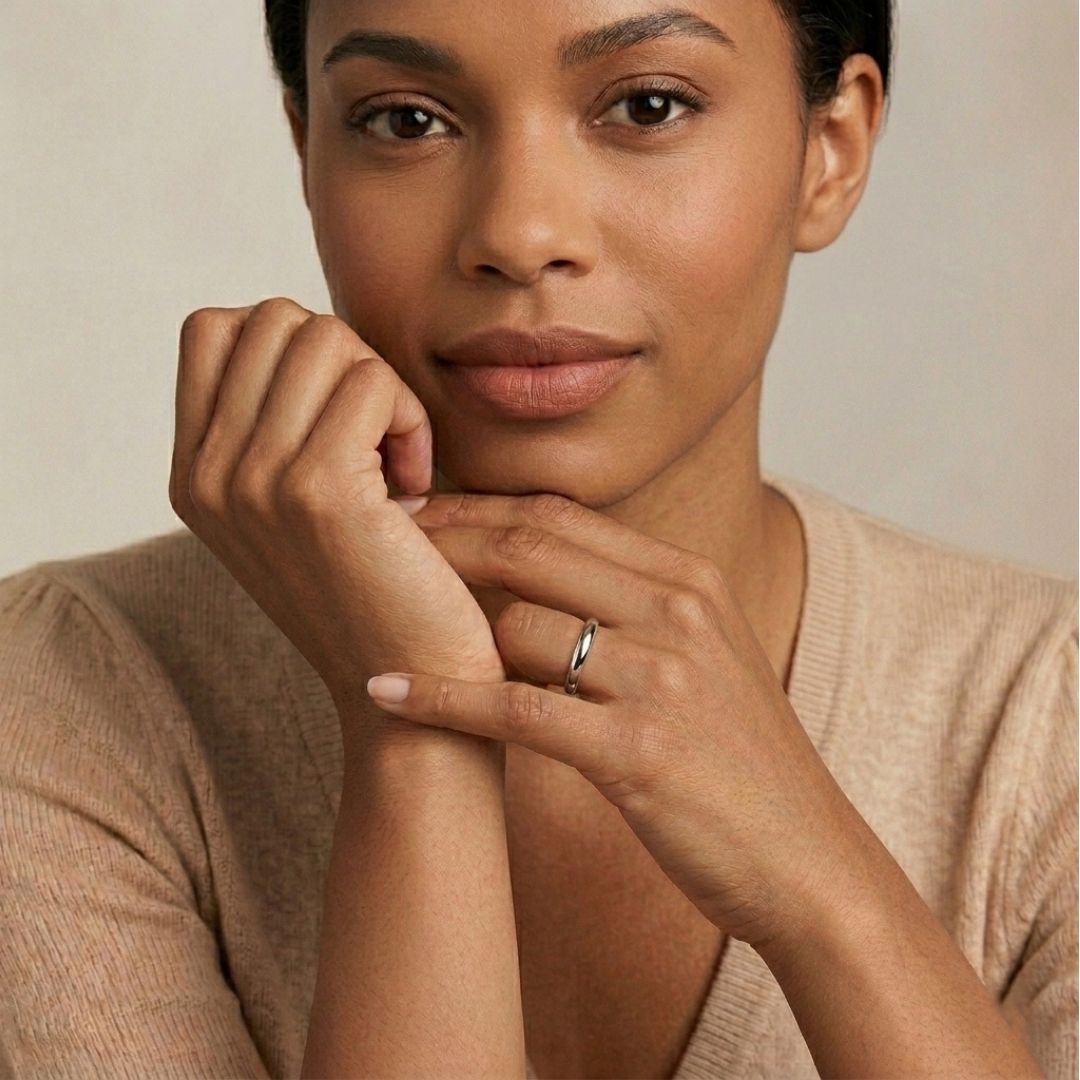 A model wearing the 3mm Slim Half Round Wedding Band in White Gold