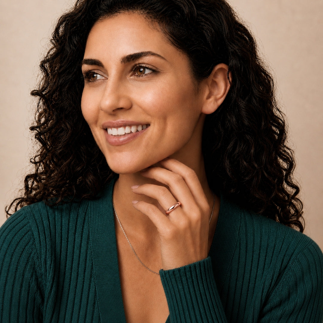 Model wearing a 4mm 14K rose gold comfort fit wedding band - AJ's Jewelry, Ridgewood NY