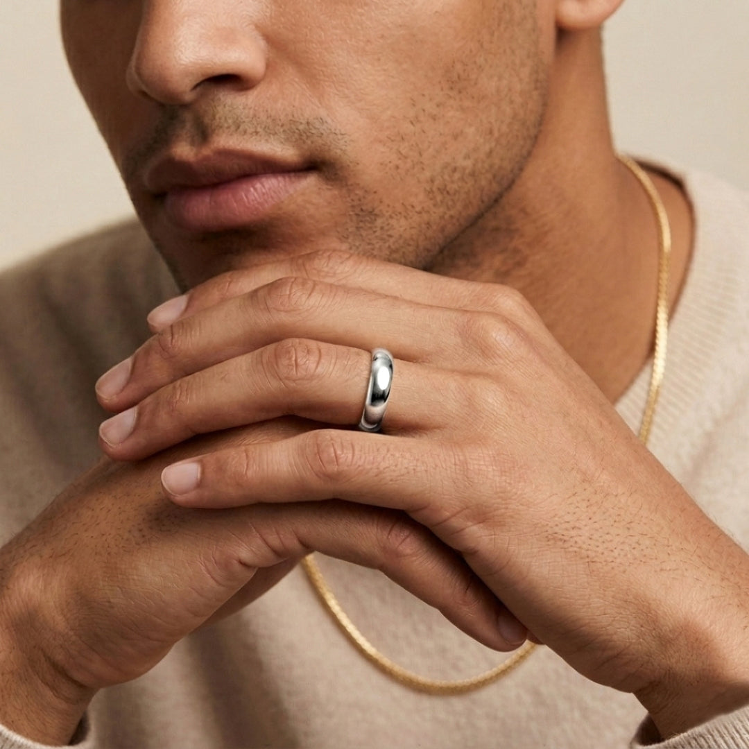 6mm 14K white gold comfort fit wedding band worn on a model's hand, close-up view - AJ's Jewelry, Ridgewood NY