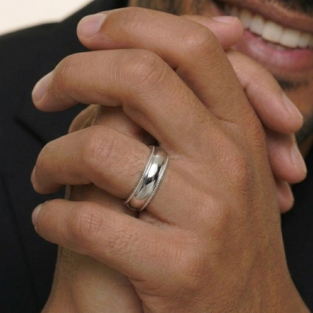 A model wearing the 6mm White Gold Comfort Fit Milgrain Wedding Band