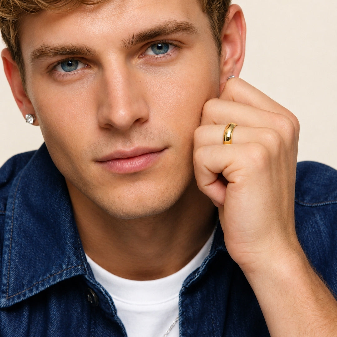 A model wearing the 6mm Slim Half Round Wedding Band in Yellow Gold