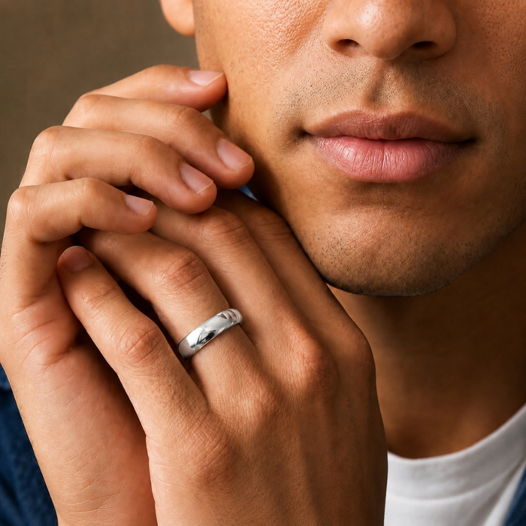 7mm 14K white gold comfort fit wedding band worn on a model's hand, close-up view - AJ's Jewelry, Ridgewood NY
