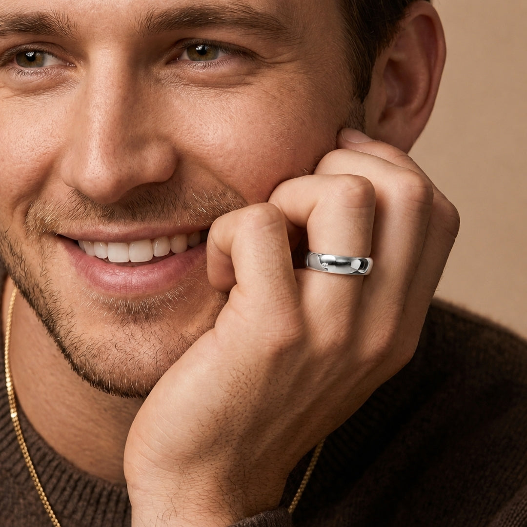 8mm 14K white gold comfort fit wedding band worn on a model's hand, close-up view - AJ's Jewelry, Ridgewood NY