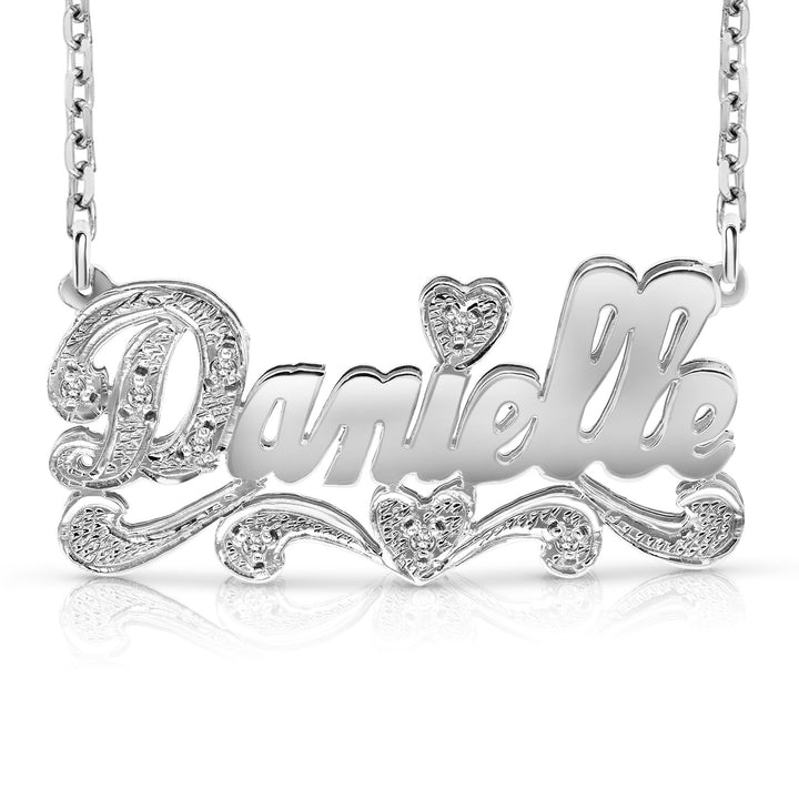 A Sample of the 14 Karat Polished and Diamond Cut 3D Name Necklace with the name Danielle in White