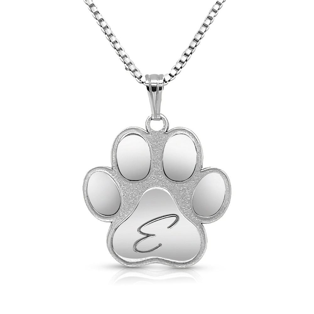 White gold necklace with paw pendant on a white background