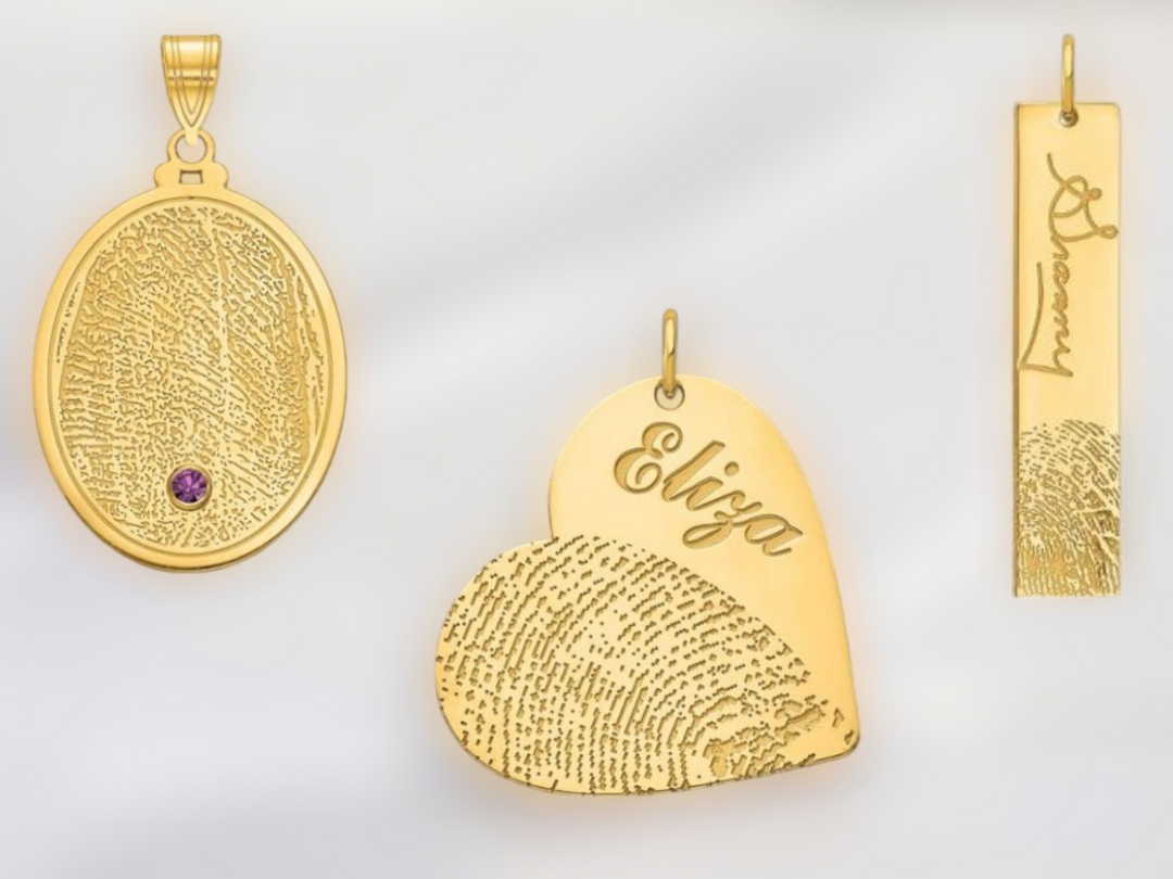 An image showing different styles of fingerprint jewelry