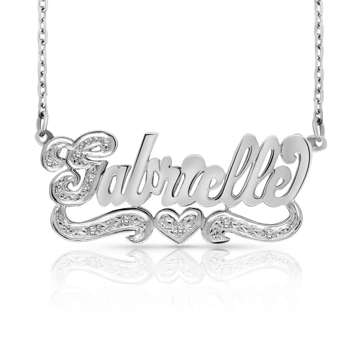 A Sample of the Sterling Silver Script 3D Name Necklace with One Heart with the name Gabrielle in White