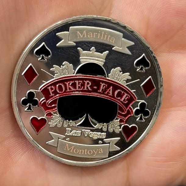 A picture showing an engraved poker chip