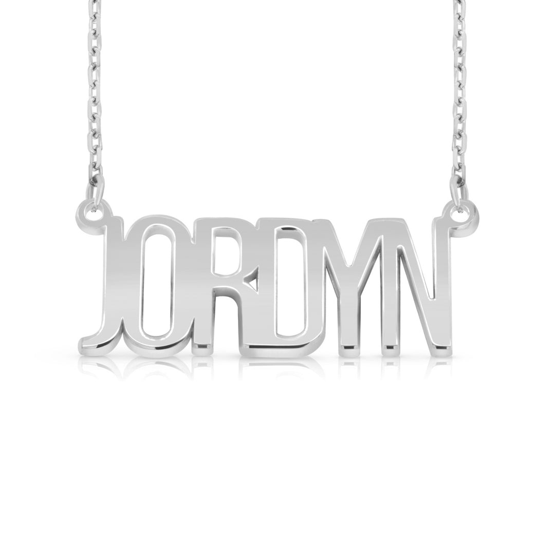 A sample of the nameplate with the name Jordyn in White Gold