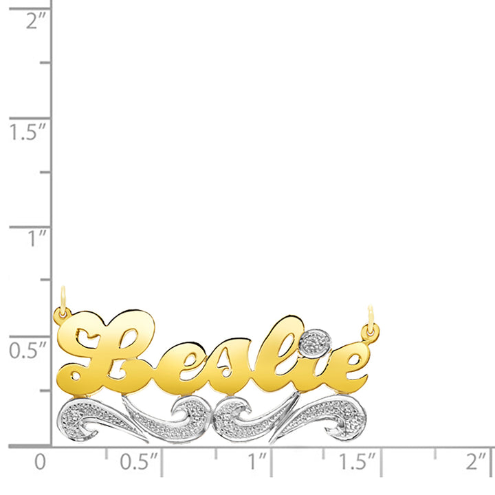 A Sample of the 14 Karat Script Name Necklace with Tail with the name Leslie on  a size chart for reference