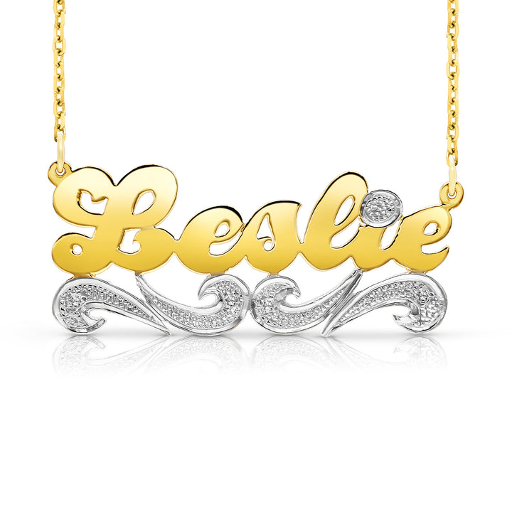 A Sample of the 14 Karat Script Name Necklace with Tail with the name Leslie in Yellow