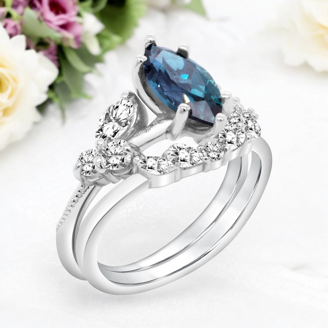 An image showing an angled view of the finished Lab Grown Alexandrite Engagement Ring with the matching band