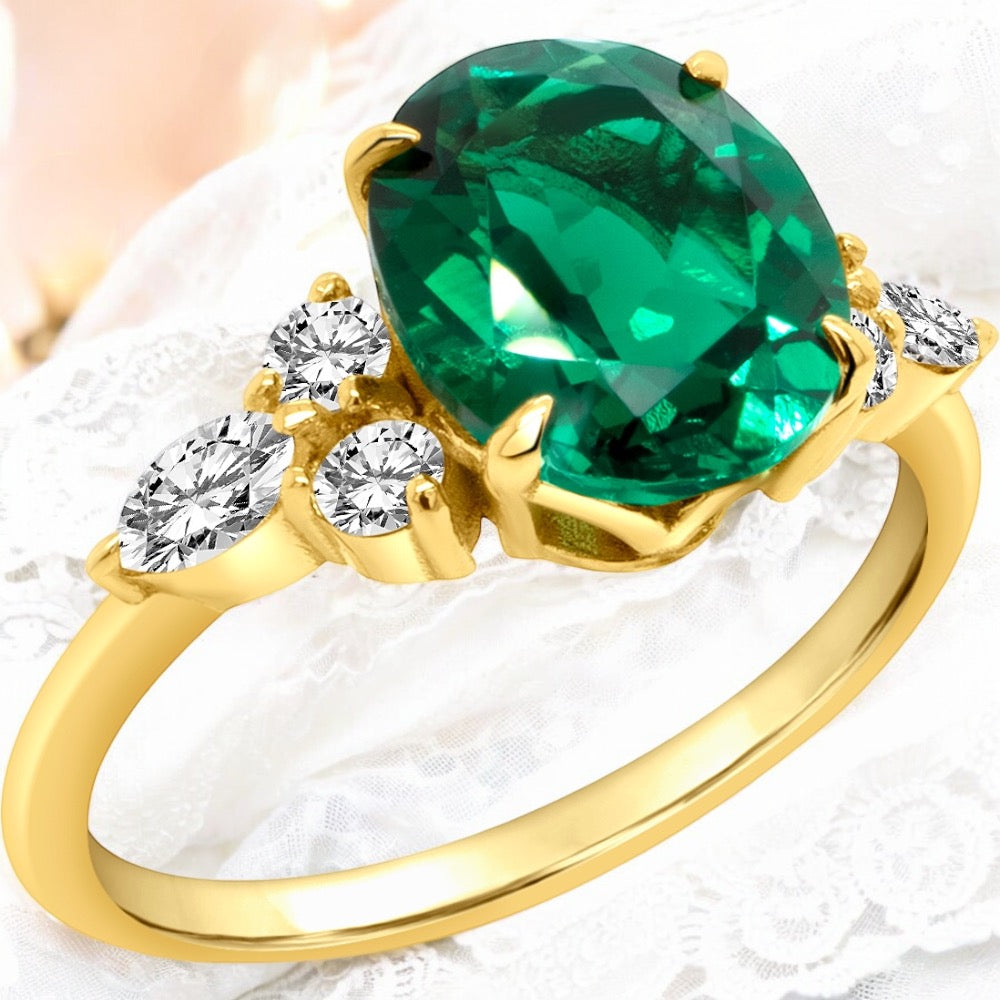 An image showing an angled view of the finished Lab Grown Emerald engagement ring