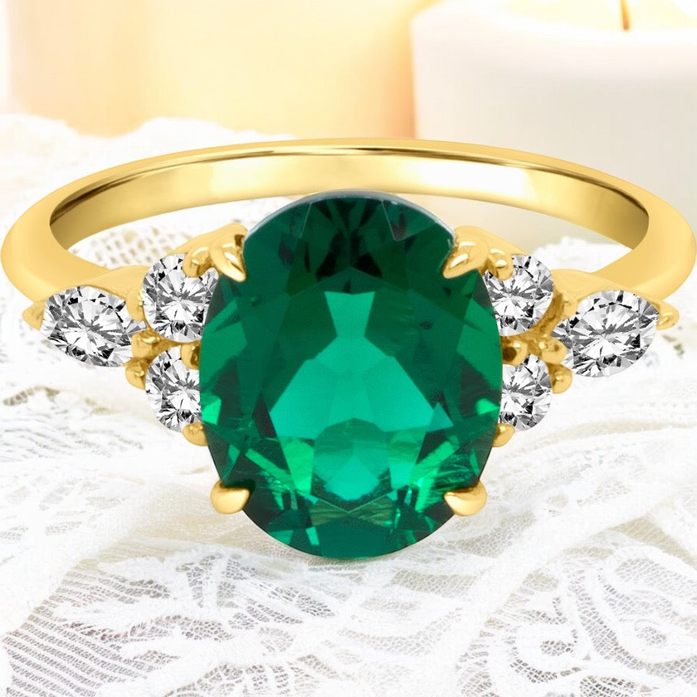 An image showing a front view of the finished Lab Grown Emerald engagement ring