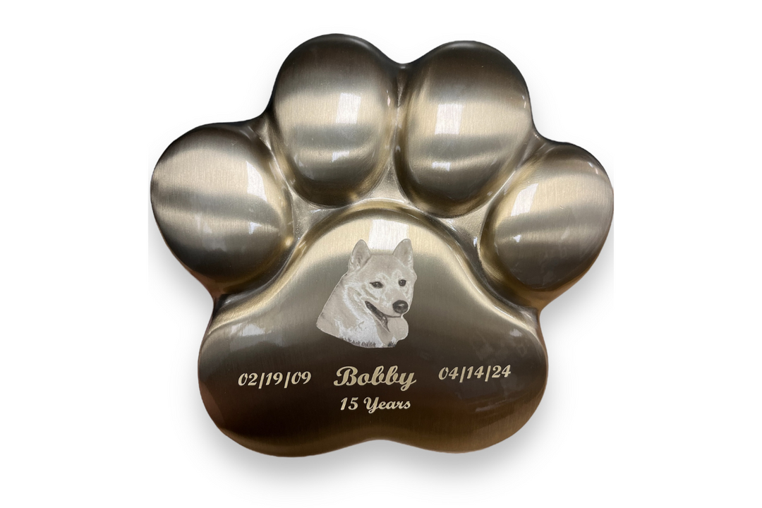 An image of a dog paw urn engraved