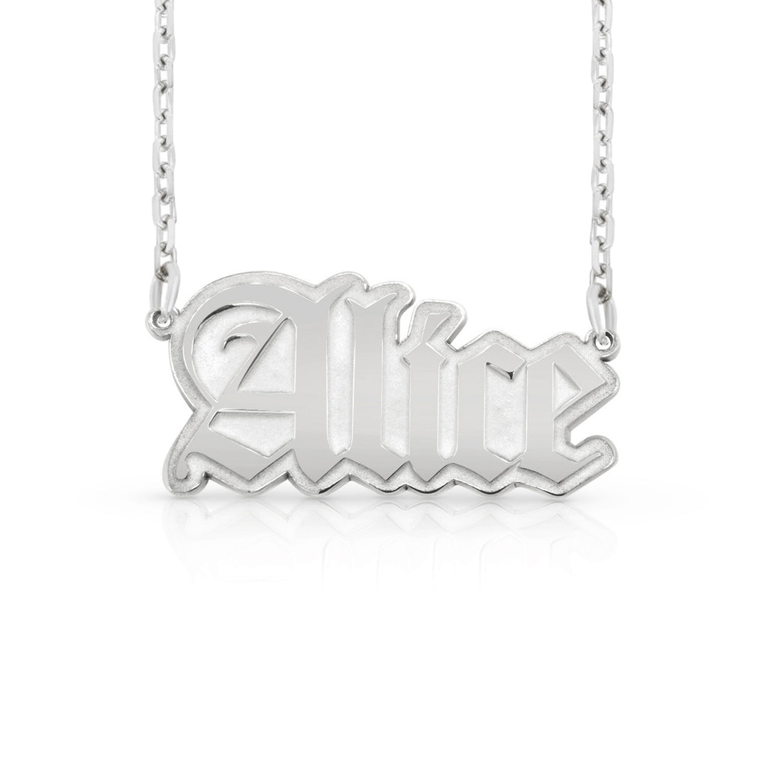 A silver nameplate necklace featuring the name 'Alice' in a stylized gothic font, suspended from a delicate silver chain against a clean white background.  This photo can change appearance depending on the name input using the custom name builder