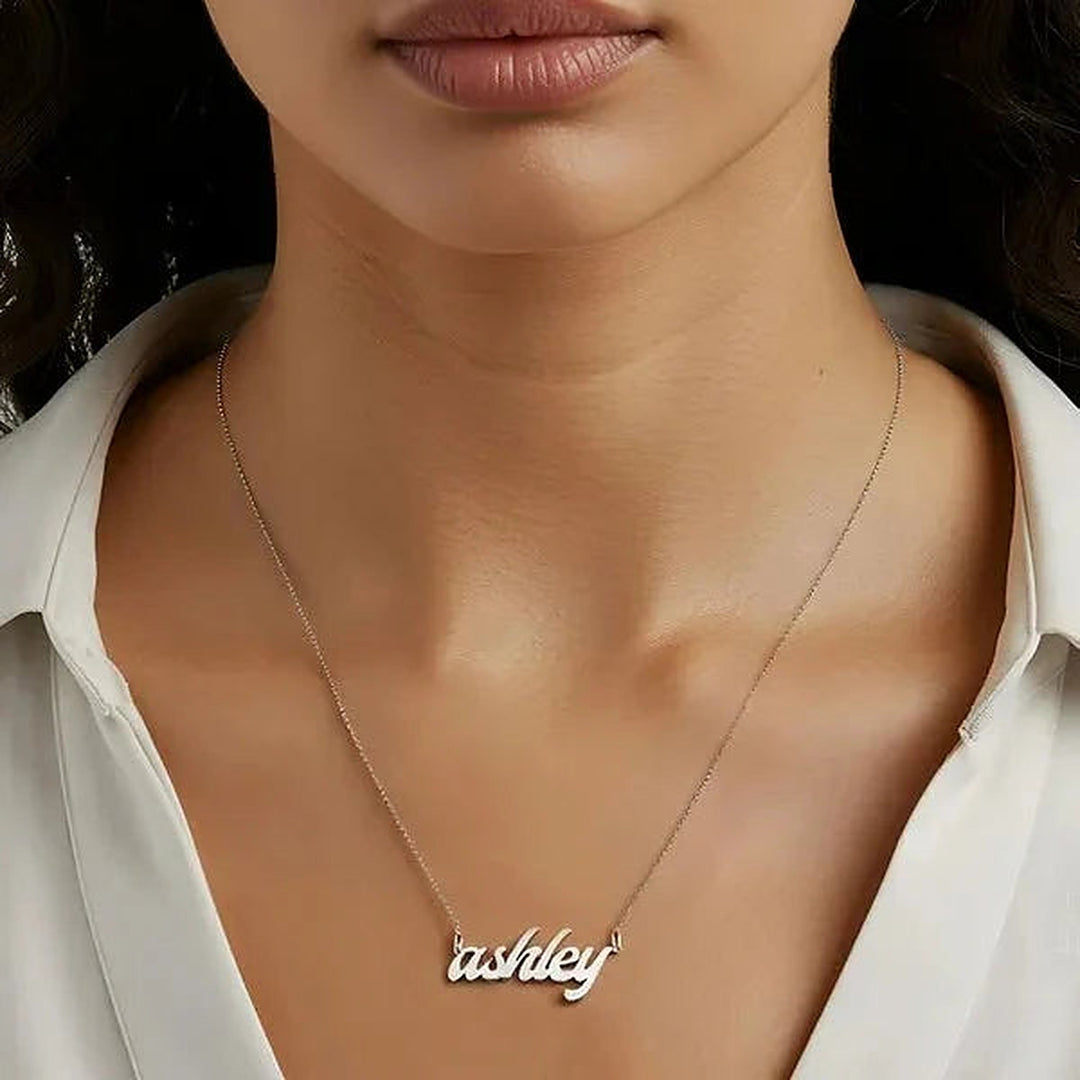 Model wearing the Sterling Silver Bold Letter Name Necklace personalized with the name Ashley | AJ's Jewelry