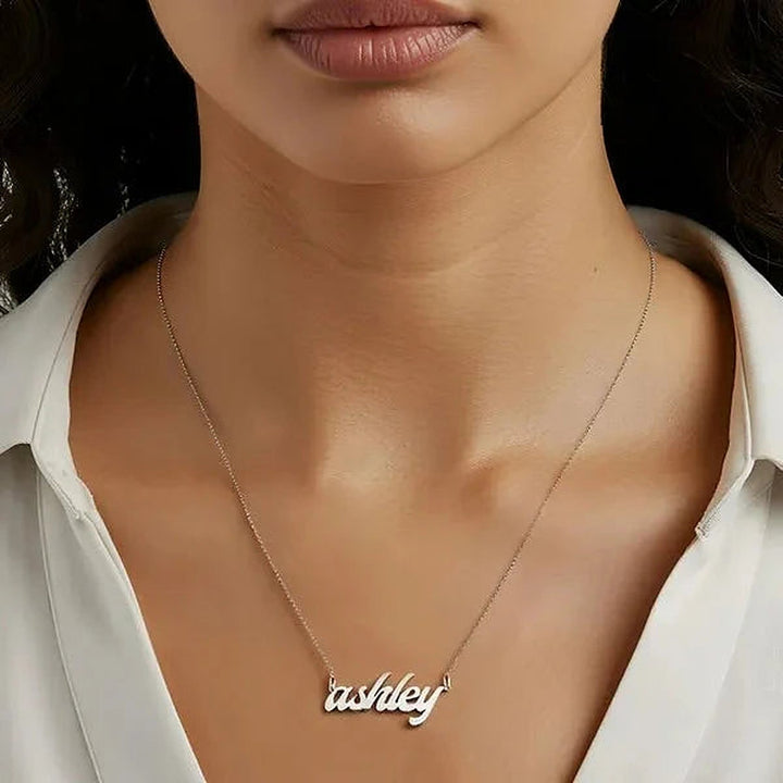 Model wearing the Sterling Silver Bold Letter Name Necklace personalized with the name Ashley | AJ's Jewelry