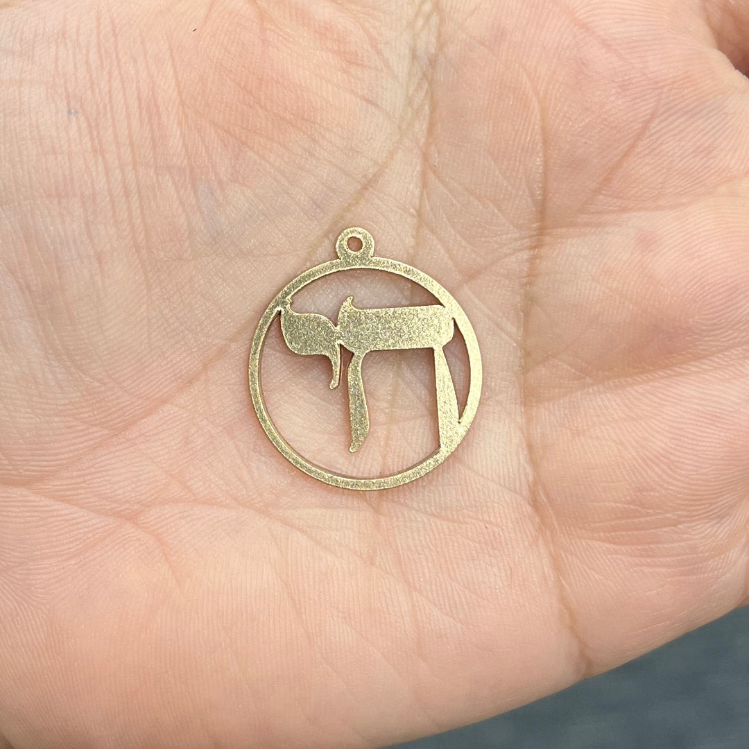 14kt yellow gold Chai pendant after laser cutting, before hand finishing at AJ's Jewelry Queens NY