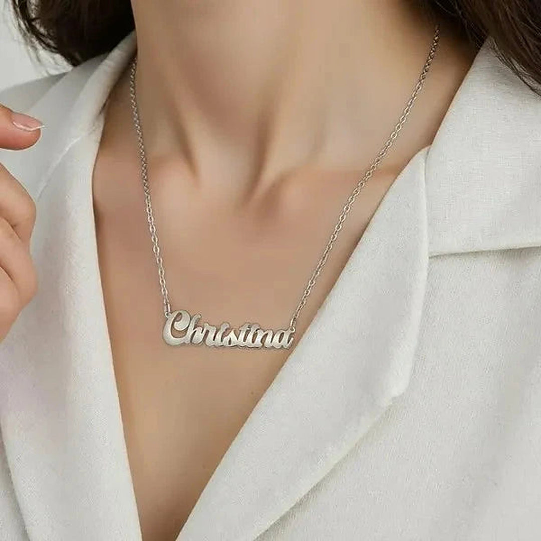 Model wearing the Sterling Silver Solid Letter Name Necklace personalized with the name Christina | AJ's Jewelry