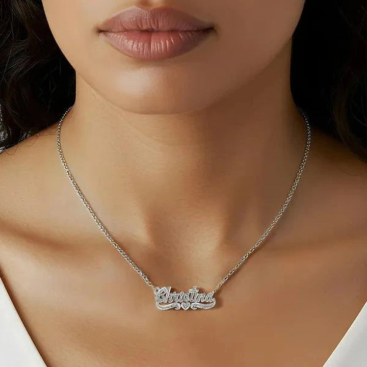 Model wearing the 14 Karat Diamond Cut 3D Name Necklace with One Heart in 14K white gold, name Christina | AJ's Jewelry