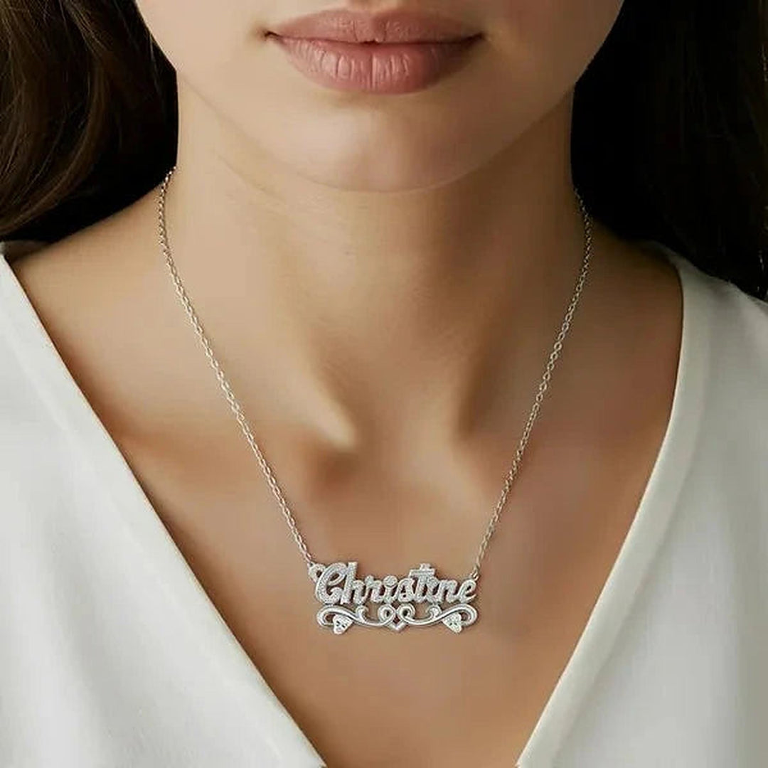 Model wearing the 14 Karat Solid Gold Name Necklace with Hearts in 14K white gold, name Christine | AJ's Jewelry