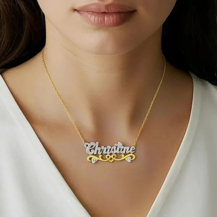 Model wearing the 14 Karat Solid Gold Name Necklace with Hearts in 14K yellow gold, name Christine | AJ's Jewelry