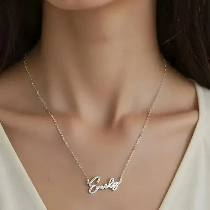 Model wearing the Sterling Silver Thin Script Name Necklace personalized with the name Emily | AJ's Jewelry