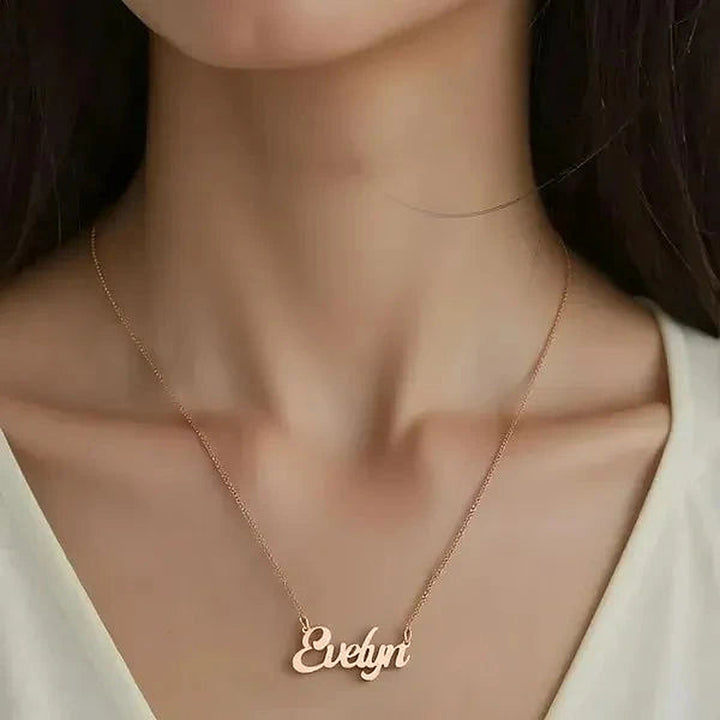 Model wearing the 14 Karat Solid Letter Name Necklace in 14K rose gold personalized with the name Evelyn | AJ's Jewelry