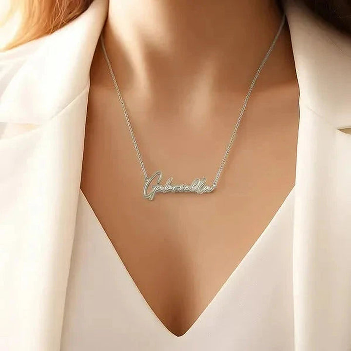 Model wearing the Sterling Silver Thin Script Name Necklace personalized with the name Gabriella | AJ's Jewelry
