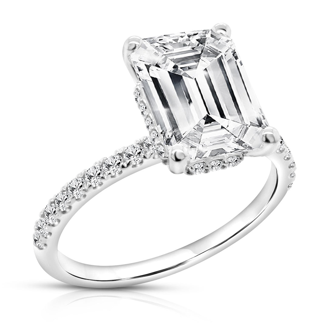 Angle view of the completed 3ct emerald shape hidden halo lab grown diamond engagement ring — AJ's Jewelry Ridgewood Queens NY
