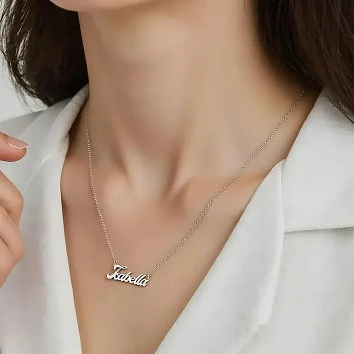 Model wearing the Sterling Silver Bold Letter Name Necklace personalized with the name Isabella | AJ's Jewelry