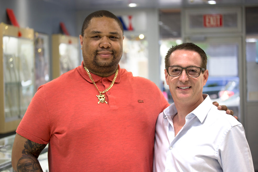 AJ's Jewelry client with the store owner after receiving his custom 14kt gold Jason hockey mask pendant — Ridgewood Queens NY